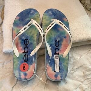 NWT BEBE Kinley flip flops platform sz 6